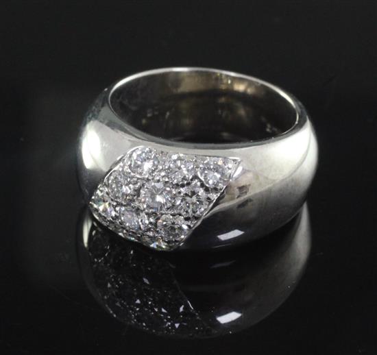 A modern 18ct white gold and diamond cluster dress ring. size P.